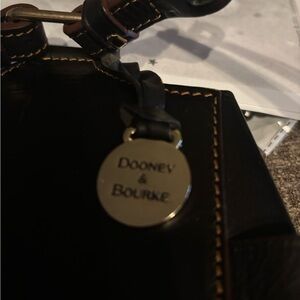 Dooney & Bourke very Vintage black funnel style leather backpack